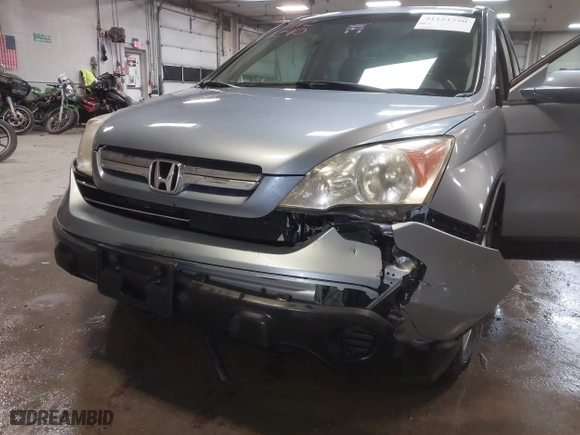 2009 Honda CR-V EX-L with VIN 5J6RE48739L037292, listed as a IAAI auction lot 41121290 with 150,597 mi miles. Bid and sale history available at carsss.com. Image 6.