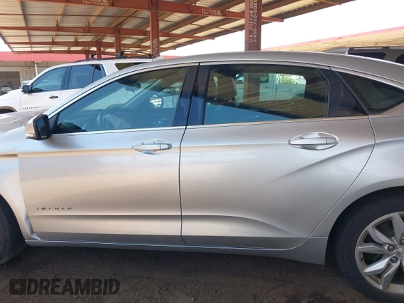 2017 Chevrolet Impala LT with VIN 1G1105S38HU210996, listed as a IAAI auction lot 42294290 with 96,250 mi miles and . Bid and sale history available at DreamBid. Image 13.