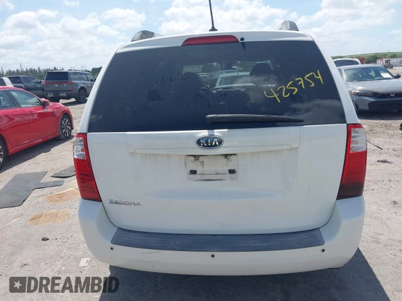 2010 Kia Sedona LX with VIN KNDMG4C33A6338047, listed as a IAAI auction lot 42128485 with 99,498 mi miles and . Bid and sale history available at carsss.com. Image 17.