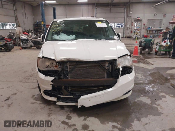 2012 Dodge Grand Caravan SXT with VIN 2C4RDGCG3CR405373, listed as a IAAI auction lot 41264407 with 164,019 mi miles and . Bid and sale history available at DreamBid. Image 13.