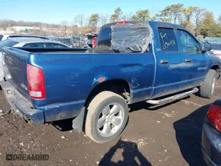 2002 Dodge Ram 1500 with VIN 1D7HU18Z52J186153, listed as a IAAI auction lot 41519191 with 999,999 mi miles. Bid and sale history available at carsss.com. Image 4.