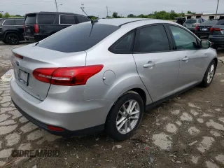 2017 Ford Focus SE with VIN 1FADP3FE2HL263592, listed as a Copart auction lot 65259845 with 74,413 mi miles and Clean title. Bid and sale history available at DreamBid. Image 3.