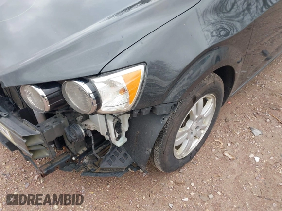 2014 Chevrolet Sonic LT with VIN 1G1JC5SH1E4236385, listed as a IAAI auction lot 42066948 with 126,200 mi miles and . Bid and sale history available at DreamBid. Image 13.