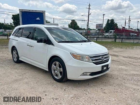 2011 Honda Odyssey Touring с VIN 5FNRL5H92BB008426, выставлен на аукционе Copart как лот 59419585 с пробегом 245 087 миль миль и Чистый • Clean title. История ставок и продаж доступна на DreamBid. Изображение 1.