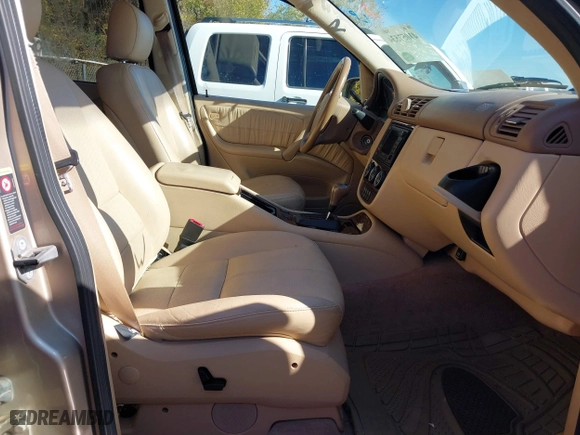2003 Mercedes-Benz M-Class 3.7L with VIN 4JGAB57E33A414218, listed as a IAAI auction lot 41057534 with 132,342 mi miles. Bid and sale history available at carsss.com. Image 5.