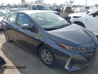 2021 Toyota Prius LE with VIN JTDKAMFP9M3171321, listed as a IAAI auction lot 41464622 with 18,868 mi miles and . Bid and sale history available at DreamBid. Image 1.