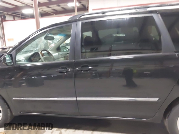 2009 Toyota Sienna XLE with VIN 5TDBK22CX9S026735, listed as a IAAI auction lot 41858014 with 187,761 mi miles and . Bid and sale history available at DreamBid. Image 14.