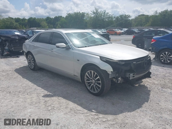 2018 Cadillac CT6 Luxury AWD z VIN 1G6KD5RS7JU101256, wystawiony jako IAAI lot #42139045 z przebiegiem 78 820 mil mil oraz . Historia ofert i sprzedaży dostępna na DreamBid. Obrazek 1.