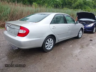 2002 Toyota Camry XLE z VIN JTDBF30K420083381, wystawiony jako IAAI lot #42368073 z przebiegiem 148 746 mil mil oraz . Historia ofert i sprzedaży dostępna na DreamBid. Obrazek 4.