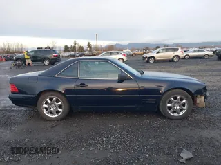 1996 Mercedes-Benz SL-Class with VIN WDBFA67F8TF129267, listed as a IAAI auction lot 41200768 with 104,836 mi miles. Bid and sale history available at carsss.com. Image 14.