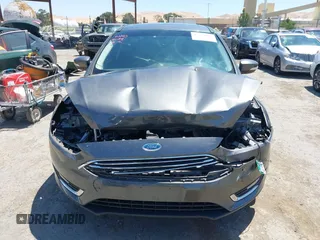 2018 Ford Focus Titanium with VIN 1FADP3N28JL232120, listed as a IAAI auction lot 42544070 with 28,661 mi miles and . Bid and sale history available at DreamBid. Image 13.