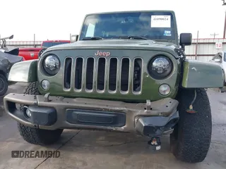 2016 Jeep Wrangler Unlimited Sahara with VIN 1C4BJWEGXGL249638, listed as a IAAI auction lot 41090024 with 98,345 mi miles and . Bid and sale history available at DreamBid. Image 6.