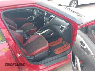2012 Hyundai Veloster w/Black Int with VIN KMHTC6AD8CU053904, listed as a IAAI auction lot 42774621 with 164,599 mi miles and . Bid and sale history available at DreamBid. Image 5.