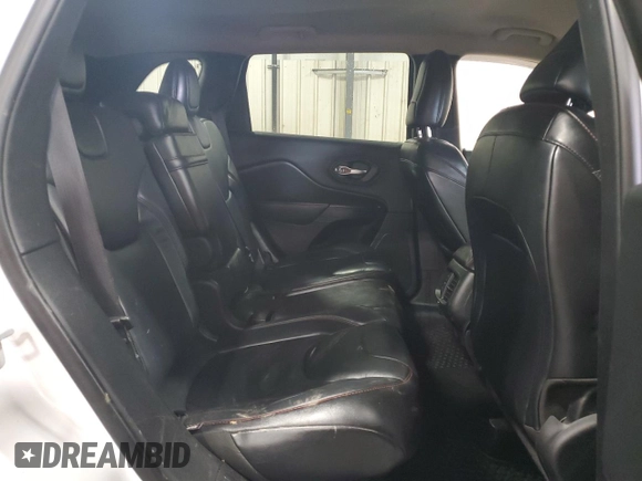 2014 Jeep Cherokee Trailhawk z VIN 1C4PJMBB5EW159957, wystawiony jako Copart lot #58535135 z przebiegiem 188 216 mil mil oraz Szkoda całkowita • Salvage title. Historia ofert i sprzedaży dostępna na DreamBid. Obrazek 11.
