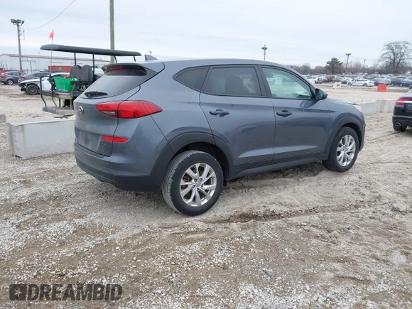 2021 Hyundai Tucson SE with VIN KM8J23A40MU299596, listed as a IAAI auction lot 41513198 with 54,284 mi miles and . Bid and sale history available at DreamBid. Image 4.
