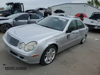 2003 Mercedes-Benz E-Class 5.0L with VIN WDBUF70J03A112909, listed as a Copart auction lot 49924865 with 158,244 mi miles and Salvage Title. Bid and sale history available at carsss.com. Image 1.