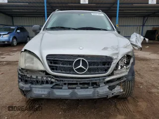 1999 Mercedes-Benz M 320/430/500 with VIN 4JGAB54E7XA078616, listed as a Copart auction lot 55301695 with 137,918 mi miles and Salvage title. Bid and sale history available at DreamBid. Image 5.