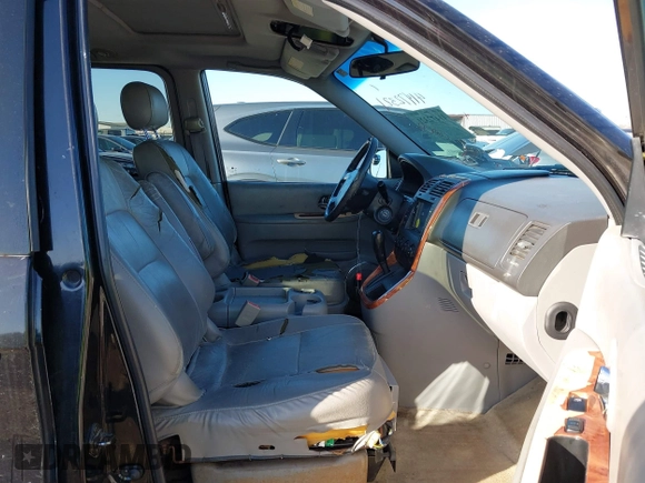 2004 Kia Sedona LX with VIN KNDUP131X46601278, listed as a IAAI auction lot 41472321 with 202,212 mi miles. Bid and sale history available at carsss.com. Image 5.