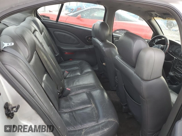 2003 Pontiac Bonneville SE z VIN 1G2HX52K534102213, wystawiony jako Copart lot #41921295 z przebiegiem 136 422 mil mil oraz Szkoda całkowita • Salvage title. Historia ofert i sprzedaży dostępna na DreamBid. Obrazek 10.