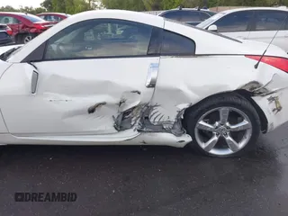 2007 Nissan 350Z Enthusiast z VIN JN1BZ34D17M501594, wystawiony jako IAAI lot #42256549 z przebiegiem Nie podano mil oraz . Historia ofert i sprzedaży dostępna na DreamBid. Obrazek 6.