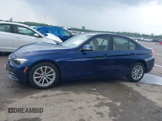 2017 BMW 3 Series 320i z VIN WBA8E1G3XHNU15607, wystawiony jako IAAI lot #42117103 z przebiegiem Nie podano mil oraz . Historia ofert i sprzedaży dostępna na DreamBid. Obrazek 13.