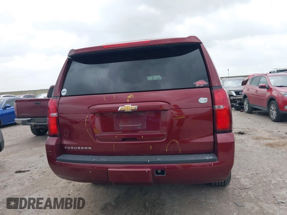2020 Chevrolet Suburban LT z VIN 1GNSCHKC9LR233596, wystawiony jako IAAI lot #41943325 z przebiegiem 97 515 mil mil oraz . Historia ofert i sprzedaży dostępna na DreamBid. Obrazek 16.