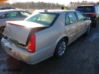 2009 Cadillac DTS w/1SA with VIN 1G6KD57Y69U110856, listed as a IAAI auction lot 41369392 with 89,282 mi miles. Bid and sale history available at carsss.com. Image 4.