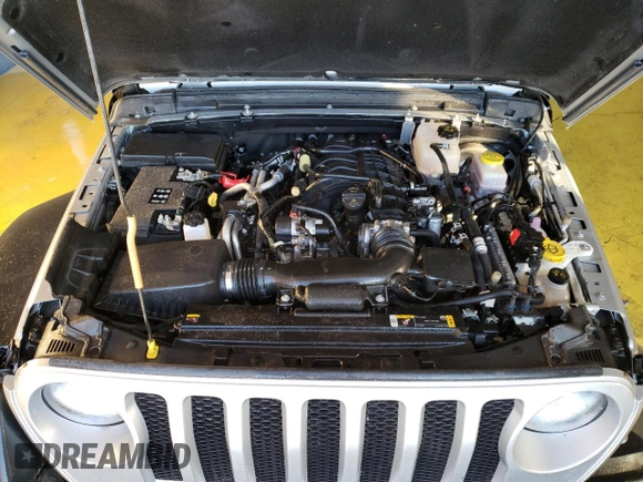 2023 Jeep Wrangler Sport S with VIN 1C4HJXDG0PW670641, listed as a Copart auction lot 41623195 with 27,266 mi miles and Salvage Title. Bid and sale history available at DreamBid. Image 12.