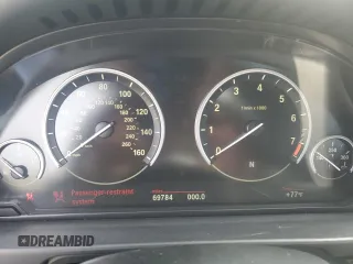 2014 BMW 5 Series 535i xDrive with VIN WBA5B3C52ED532324, listed as a Copart auction lot 52779365 with 69,784 mi miles and Clean Title. Bid and sale history available at carsss.com. Image 9.