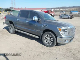 2017 Nissan Titan SV with VIN 1N6AA1E51HN537452, listed as a IAAI auction lot 41790728 with 82,521 mi miles and . Bid and sale history available at DreamBid. Image 1.