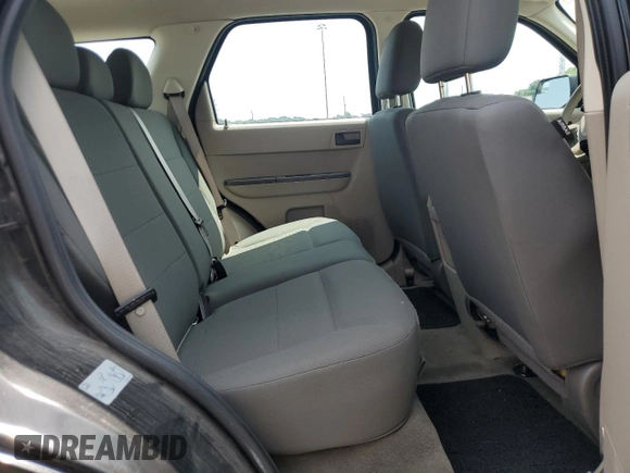 2011 Ford Escape XLS z VIN 1FMCU0C78BKB77957, wystawiony jako Copart lot #63610285 z przebiegiem 180 578 mil mil oraz Czysty tytuł • Clean title. Historia ofert i sprzedaży dostępna na DreamBid. Obrazek 11.