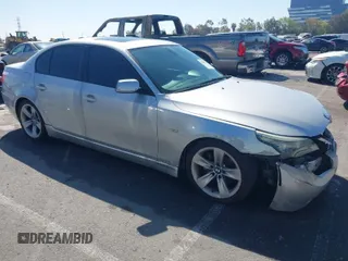 2010 BMW 5 Series 528i with VIN WBANU5C51AC125956, listed as a IAAI auction lot 41845322 with 318,279 mi miles and . Bid and sale history available at carsss.com. Image 1.
