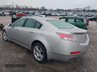 2009 Acura TL Tech with VIN 19UUA86569A020715, listed as a IAAI auction lot 41521211 with 179,977 mi miles. Bid and sale history available at carsss.com. Image 3.