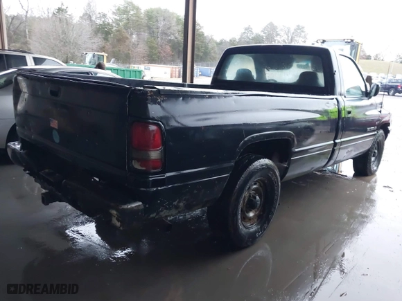 1996 Dodge Ram 1500 Work Special with VIN 1B7HC16X5TS698036, listed as a IAAI auction lot 41079518 with 220,948 mi miles. Bid and sale history available at carsss.com. Image 4.