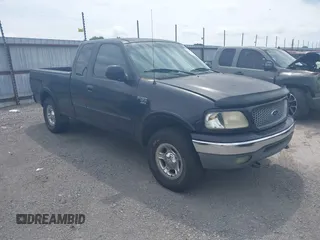 1999 Ford F-150 XL with VIN 1FTRX18L3XNA05021, listed as a IAAI auction lot 42138727 with 1 mi miles. Bid and sale history available at carsss.com. Image 1.