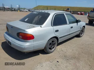 2000 Chevrolet Prizm LSi z VIN 1Y1SK5287YZ408470, wystawiony jako IAAI lot #42116829 z przebiegiem 237 089 mil mil oraz . Historia ofert i sprzedaży dostępna na DreamBid. Obrazek 4.