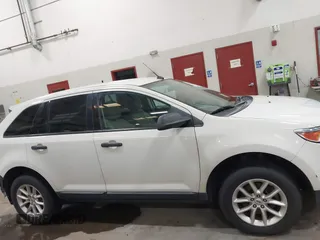 2013 Ford Edge SE z VIN 2FMDK3GC2DBC66486, wystawiony jako IAAI lot #42630850 z przebiegiem 133 750 mil mil oraz . Historia ofert i sprzedaży dostępna na DreamBid. Obrazek 14.