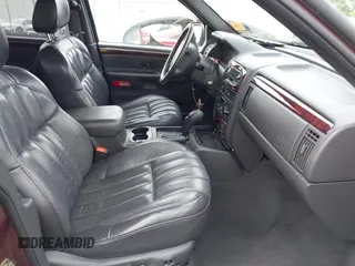 2000 Jeep Grand Cherokee Limited with VIN 1J4GW58N4YC423095, listed as a IAAI auction lot 42275933 with 135,684 mi miles and . Bid and sale history available at DreamBid. Image 5.