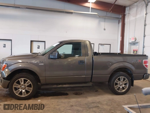2014 Ford F-150 XL with VIN 1FTMF1CF7EFC67887, listed as a IAAI auction lot 41961500 with 83,934 mi miles and . Bid and sale history available at DreamBid. Image 14.