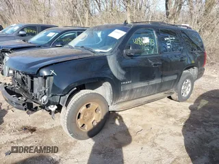 2012 Chevrolet Tahoe LS with VIN 1GNSCAE09CR161937, listed as a IAAI auction lot 41846873 with 218,462 mi miles and . Bid and sale history available at DreamBid. Image 19.