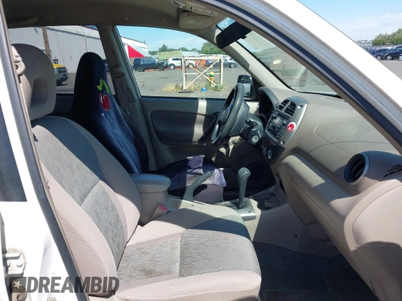 2001 Toyota RAV4 with VIN JTEGH20V610012097, listed as a IAAI auction lot 42652021 with 168,152 mi miles and . Bid and sale history available at DreamBid. Image 5.