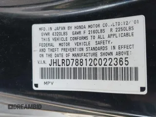 2002 Honda CR-V EX with VIN JHLRD78812C022365, listed as a IAAI auction lot 41886593 with 228,212 mi miles. Bid and sale history available at carsss.com. Image 9.
