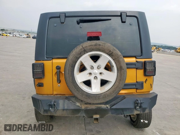 2014 Jeep Wrangler Sport z VIN 1C4AJWAG7EL181121, wystawiony jako Copart lot #42599235 z przebiegiem 130 721 mil mil oraz Szkoda całkowita • Salvage title. Historia ofert i sprzedaży dostępna na DreamBid. Obrazek 6.