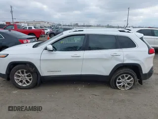 2015 Jeep Cherokee North with VIN 1C4PJMCS6FW564435, listed as a IAAI auction lot 41992440 with 166,048 mi miles. Bid and sale history available at carsss.com. Image 14.