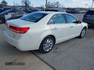 2012 Lincoln MKZ with VIN 3LNHL2JC4CR831614, listed as a IAAI auction lot 41883378 with 92,819 mi miles. Bid and sale history available at carsss.com. Image 4.