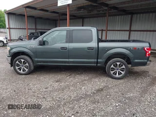 2018 Ford F-150 XL with VIN 1FTEW1EG4JKE17790, listed as a IAAI auction lot 42128519 with 153,740 mi miles. Bid and sale history available at carsss.com. Image 14.