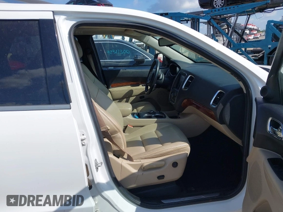 2014 Dodge Durango Limited with VIN 1C4RDJDGXEC323129, listed as a IAAI auction lot 42318727 with 148,451 mi miles and . Bid and sale history available at DreamBid. Image 5.