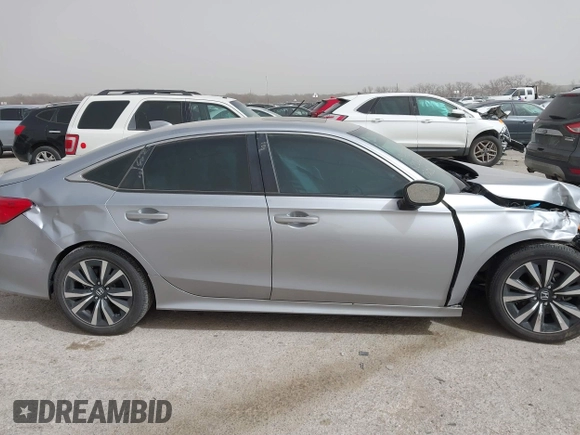 2023 Honda Civic EX with VIN 2HGFE1F77PH321210, listed as a IAAI auction lot 41797011 with 8,748 mi miles and . Bid and sale history available at DreamBid. Image 13.