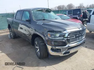 2022 Ram 1500 Laramie with VIN 1C6SRFJT5NN349389, listed as a IAAI auction lot 41833715 with 28,596 mi miles and . Bid and sale history available at DreamBid. Image 1.