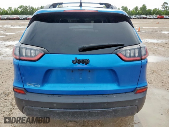2021 Jeep Cherokee Altitude with VIN 1C4PJLLB0MD215189, listed as a Copart auction lot 61094535 with 88,449 mi miles and Salvage title. Bid and sale history available at DreamBid. Image 6.